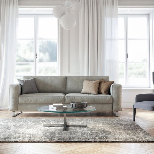 grey couch and furniture infront of large window