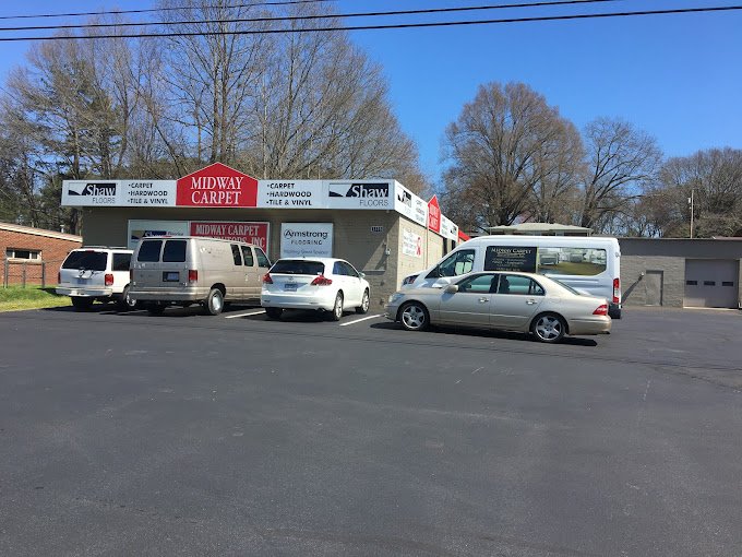 Midway carpet dist. storefront